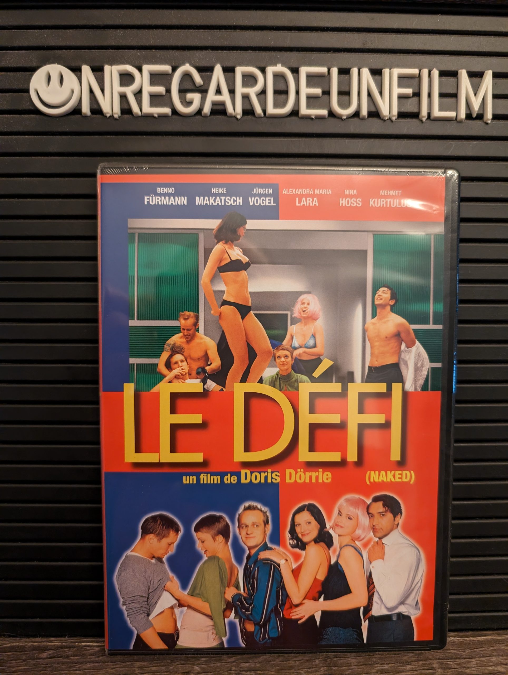 Le Défi / Naked (2002)
