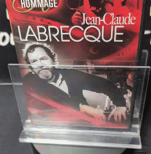 COFFRET COLLECTION HOMMAGE JEAN-CLAUDE LABRECQUE 
60 Cycles (1965) & La Visite du Général de Gaulle au Québec (1967) & L'Hiver en Froid Mineur (1969) & Les Canots de Glace (1969) & La Nuit de la Poésie 27 Mars 1970 (1971) & Images de la Gaspésie (1972) & Les Smattes (1972) & Claude Gauvreau: Poète (1974) & Les Vautours (1975) & Pierre à Coton (1978) & La Nuit de la Poésie 28 Mars (1980) & Marie Uguay (1982) & Le RIN (2002) & À Hauteur d'Homme (2003) & Félix (2009)